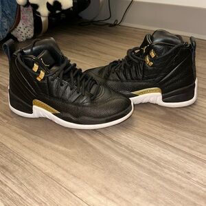 Black and Gold Jordan 12s